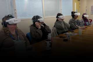 Staff at Education Impact Academy Trust taking part in a Cornerstone VR session